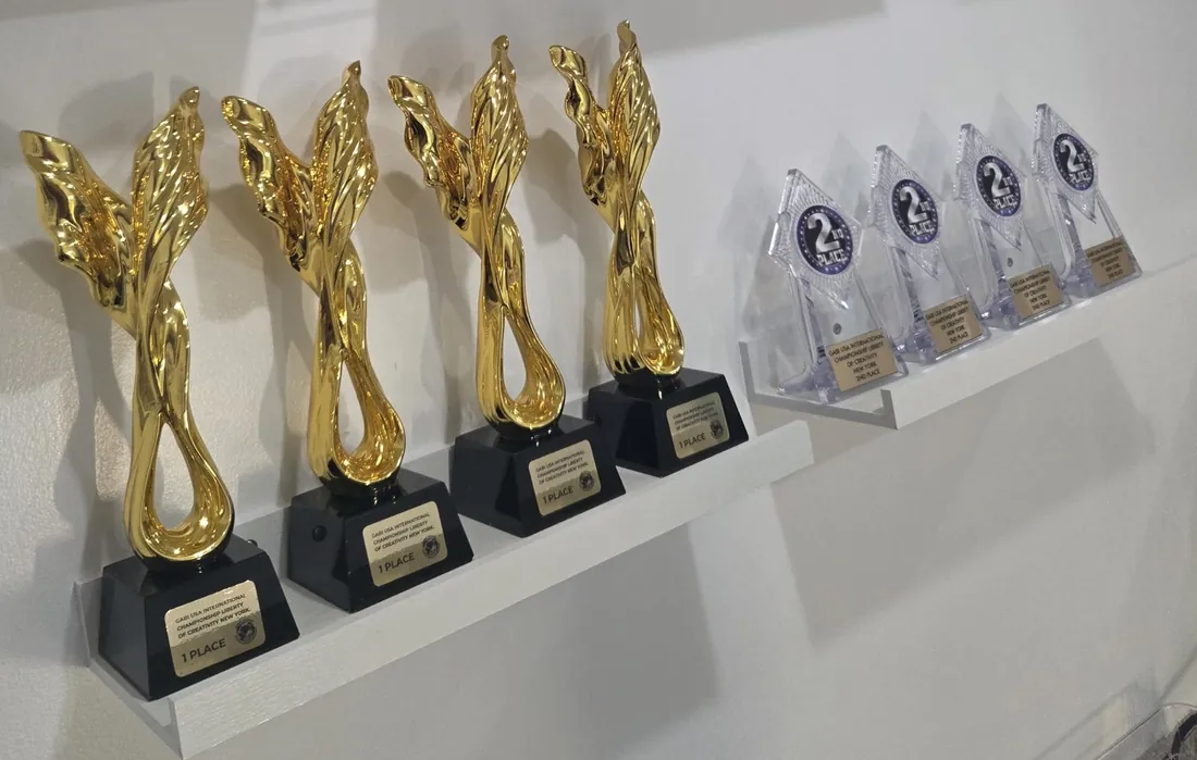 Four first-place and four second-place trophies Yulia won at the GABI USA International Championship 2026 in New York